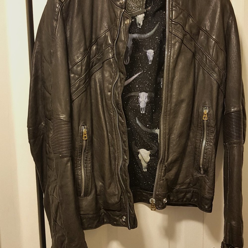 Unisex biker leather jacket.